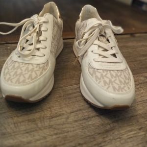 Michael Kors tennis shoes.